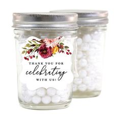 two glass jars filled with white candies and the words thank you for celebrating the bride to be