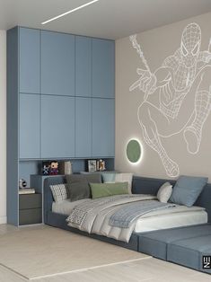 a room with a bed, couch and shelves on the wall that have spiderman drawn on it