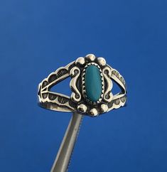 * Stunning Sterling Silver 925 Cabochon Blue Turquoise Openwork Ring Size 5.25 * Metal: Sterling Silver 925 * Stone(s): (1) Cabochon Blue Turquoise  * Turquoise Carat Weight: approx 0.20 ct * Ring Size: 5.25 * Band Width: 2.82 mm * Weight: 2.7 tgw * Markings: Makers Mark * STERLING * Condition: As pictured. * S3000    Exported By ExportYourStore :) Classic Adjustable Turquoise Ring In Sterling Silver, Heirloom Style Turquoise Sterling Silver Ring, Southwestern Sterling Silver Ring With Cabochon, Southwestern Sterling Silver Cabochon Rings, Southwestern Sterling Silver Rings With Cabochon, Sterling Silver Turquoise Ring Cabochon For Jewelry Making, Owl Wall Art, Owl Wall, Bleu Turquoise