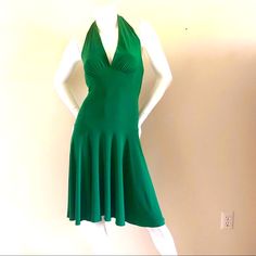 Fabulous Emerald Green Halter Dress With Long Ties. Can Be Worn Countless Ways. -Size M -V-Neck -Long Versatile Ties At Neck -92%Polyester, 8% Spandex Colors May Vary With Lighting And Screen Resolution. Green Stretch V-neck Dress, Fitted Green V-neck Dress For Date Night, Green V-neck Halter Dress For Party, Fitted V-neck Dress With Flattering Silhouette For Summer, Fitted Summer V-neck Party Dress, Green Stretch Halter Neck Dress, Summer Evening Stretch V-neck Dress, Stretch V-neck Lined Mini Dress, Stretch V-neck Mini Dress