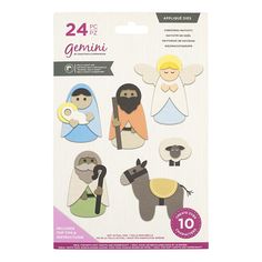 a package of paper cutouts with nativity scenes