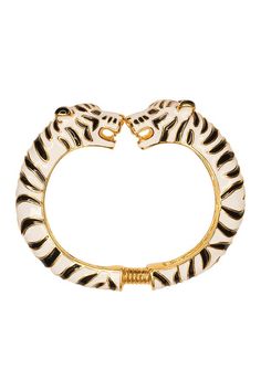 This statement bracelet will tap into your inner animal instincts. Youll be seeing double for days with this striking black and white enamel hinged gold plated bracelet.    Gold plated Black and white enamel Double tiger heads 2 1/4 inside diameter expands to 2 1/2 inches Spring hinge From the Kenneth Jay Lane Costume Jewelry Collection Featured in Shape/July-August 2018 Tiger Bracelet, Tiger Jewelry, Seeing Double, Tiger Head, Costume Collection, Stacked Jewelry, White Tiger, Gold Plated Bracelets, Spring Hinge