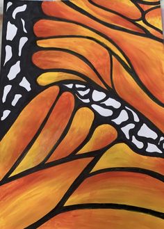 an orange and black butterfly wing painted on canvas