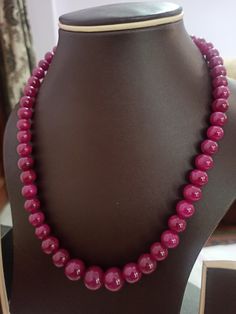 Ruby Necklace Natural Ruby Corundum Smooth Round Beads 501 Carat Ruby Necklace 1.Ruby Corundum 2. Ruby Round Beads 3. 18 inches length, 1 Line String 4. 501 -carat weight 5. 12x12 - 9x9 mm stone size Polish :- Handmade Purity :- AAA These natural Ruby gemstones can be used to make different jewellery items like earrings, bracelets and others. They have a great shine to them and makes a great gift for your loved ones. Click below to see live stock: https://www.etsy.com/au/shop/ShakugemsStore?ref= Ruby Necklaces With Round Faceted Beads, Round Ruby Necklaces With Faceted Beads, Single Strand Ruby Bead Necklace, Round Ruby Necklace With Faceted Beads, Ruby Jewelry With Polished Beads, Ruby Single Strand Beaded Necklaces With Round Beads, Single Strand Ruby Beaded Necklace With Round Beads, Round Ruby Beaded Necklace With Polished Beads, Single Strand Ruby Beaded Necklaces With Round Beads