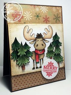 a christmas card with a moose wearing a red scarf and snowflakes on it