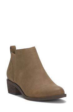 A cushioned footbed brings casual comfort to an ankle-height faux leather boot featuring a low stacked block heel. 1 1/2" shaft height Pull-on style Synthetic and textile upper/synthetic lining and sole Imported Faux Leather Boots, Leather Boot, Womens Boots Ankle, Boot Shoes Women, Mid Calf, Lucky Brand, Knee High, Block Heels, Bootie Boots