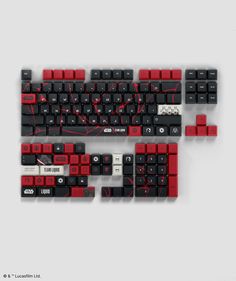 two black and red keyboards sitting next to each other on a white surface with the words love written across them