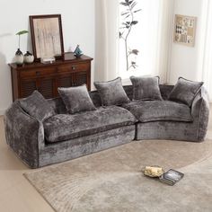 a living room with a large sectional couch