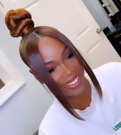 Topknot Bun With Bangs, Twisted Bun Hairstyles For Black Women, Ponytails With Shaved Sides, High Ponytail With Bangs Hairstyles For Black Women, Sleek Ponytail With Bangs Black Women, High Bun With Bangs For Black Women, Top Knot With Bangs Black Women, Two Bangs With Bun, Ponytail With Swoop For Black Women