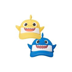 two hats that are shaped to look like shark heads, one is yellow and the other is blue