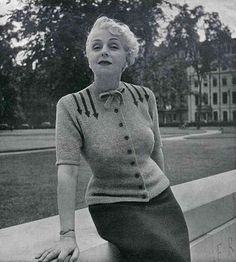 an old black and white photo of a woman