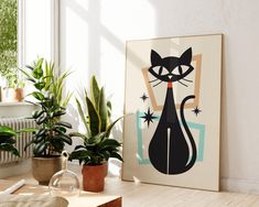 a black cat sitting on top of a wooden table next to potted plants in front of a window