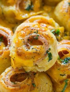 baked rolls with cheese and herbs in a casserole dish, ready to be eaten