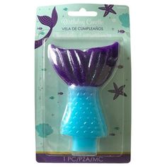 a blue and purple hair brush in its package