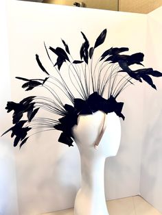 Black fascinator- Mohawk- Music festival- Fashion headdress  Hello,    This headpiece has burn out black feathers that just have the tip of the feathers still on the bone. I made velvet bows at the base, 10 in all. Four on each side, and one in the front and one in the back. The base has wire in it, so it's adjustable to fit anyone's head. The headband is  adjustable and so is the mohawk so adjust to your head size plus  it stay on your head while you dance!  I can in any color to match your hair. This headband is very comfortable. If you have any questions please ask me. ------------------------------------------------ Another unicorn style: https://www.etsy.com/listing/522977148/mohalk-headpiece-mohawk-headdress-black ------------------------------------------------ I ship US Postal Serv Headpiece Ideas, Black Headpiece, Gold Masquerade Mask, Black Velvet Bow, Black Bows, Velvet Bows, Mohawks, Black Fascinator, Bride Hat