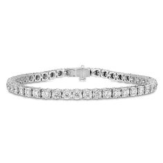 Make a statement with this irresistible diamond tennis bracelet. Crafted in 14K white gold, this bright choice showcases sparkling prong-set diamonds in collars that catch and reflect light for a dazzling presentation. Radiant with 1 ct. t.w. of diamonds and a brilliant buffed luster, this must-have 7.0-inch bracelet secures with a tongue and groove clasp. Dazzling White Adjustable Tennis Bracelet, White Cubic Zirconia Tennis Bracelet With Brilliant Cut, White Diamond-accented Tennis Bracelet As Gift, Luxury Hand-set White Gold Tennis Bracelet, White Gold Cubic Zirconia Tennis Bracelet, Hallmarked, Tennis Bracelet Diamond, Tennis Bracelet, Prong Setting, Tennis