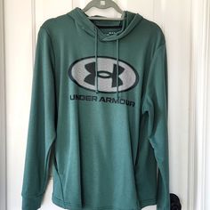 Green Under Armour Hoodie. Two Pockets. Drawstring Hood. Nwot. Bought On Vacation. Took Off The Tags And Realized I Got The Wrong Size. Loose Fit Green Hoodie Sportswear Top, Green Sportswear Hoodie Top, Green Athleisure Top With Drawstring Hood, Green Sports Hoodie Top, Green Hooded Sportswear Top, Green Hooded Sports Top, Green Hooded Top For Sports, Casual Green Under Armour Top, Casual Green Tops By Under Armour