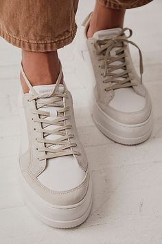 Stand out in these so cool statement platform sneakers featuring a low-top silhouette and chunky rubber sole.* Lace-up closures* Cushioned collar and footbed* Monochromatic design Comfy Platform Sneakers, Women Work Sneakers, Chunky Sneakers With Dress, Fall Platform Shoes, Best Platform Sneakers, Platform White Shoes, Fashion Tennis Shoes Womens, Fall 2024 Shoes, Unique Shoes Sneakers