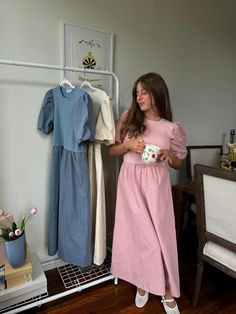 This Bridgerton-inspired dress combines Regency-era charm with modern elegance. The ribbed bodice offers a fitted shape, while the puffed sleeves add a touch of classic style. The flowy skirt moves gracefully, making it the perfect whimsical choice for any occasion. Lined 100% Cotton, Contrast 65% Rayon, 35% Nylon Runs true to size Daphne Dress, Regency Era, Flowing Skirt, Flowy Skirt, Puffed Sleeves, Inspired Dress, Cream Dress, Fast Fashion, Cute Dresses