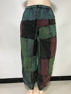 "Such a nice and colorful pants which are great as a casual wear on daily basis.Take it and enjoy its comfort either in your holidays or short breaks or even better in festivals.Adore yourself with these lovely pants while shopping or chilling with your mates.Classic hippie pants. Features Elasticated waist.Normally stretches 7-8 inches all around. Two front pockets. Assorted prints and colors in front and back. Great during autumn,spring and winter. Nice and comfy in winter if worn with thermal underneath. Length 39\" Waist 22\"- 36\" THANK YOU KULTURAL VIBEZ" Colorful Wide Leg Cotton Pants, Colorful Cotton Wide Leg Pants, Colorful Casual Bottoms With Pockets, Colorful Casual Cotton Pants, Casual Colorful Cotton Pants, Baggy Multicolor Wide-leg Pants, Baggy Wide Leg Multicolor Pants, Casual Multicolor Pants With Elastic Waistband, Green Bohemian Relaxed Fit Harem Pants