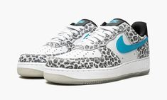 The Nike Air Force 1 Low PRM “Snow Leopard” is an imaginative look for the retro basketball shoe that combines different prints and materials for a casual vibe.  The “Snow Leopard” features white leather on the perforated toe and mid-panel that is contrasted by hairy Snow Leopard print on the toe cap, forefoot, eyelets, collar, and heel.  A teal leather Swoosh breaks up the look on both sides.  Additional teal accenting comes into play on the “Nike” and Swoosh branding on the black leather tongu Leopard Nikes, Snow Leopard Print, Retro Basketball Shoes, Retro Basketball, Leopard Shoes, White Shoes Sneakers, Teal Leather, Nike Air Force 1 Low, Nike Air Max 95