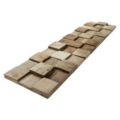 a long wooden plank laying on top of each other in the middle of a white background