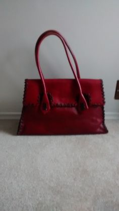 Vintage Genuine Red Leather bag, Brighr Red  leather,, stylish Boho Bag, The bag is 10 in H and 15,5 inch W with 4,5 inch topping 2 straps are 11 inch tall  Bag has 1 large section with 1 6,5 inch zipped pocket and 2 open pockets Interior clean  , bag is from 1980-1990 From smock and pet free home Red Rectangular Satchel With Top Carry Handle, Red Leather Travel Satchel, Burgundy Leather Handheld Shoulder Bag, Designer Red Soft Leather Shoulder Bag, Designer Red Shoulder Bag In Soft Leather, Designer Red Square Satchel, Vintage Red Shoulder Bag With Double Handle, Red Vintage Shoulder Bag With Double Handle, Red Top Handle Satchel With Leather Handles