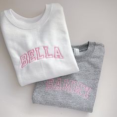 This cozy pullover sweatshirt is cotton/poly blend is embroidered with your little one's name across the front of the chest. Available in 2T-7.  Please wash on cold and dry on low. If you are wanting a different design, more wording, or a different clothing style, please send me a message so we can discuss the details. Please leave the thread color you would like in the personalization box. Long Sleeve Sweatshirt With Embroidered Logo For School, Long Sleeve Sweatshirt With School Spirit Embroidery, School Spirit Embroidered Cotton Sweatshirt, White School Spirit Sweatshirt With Letter Embroidery, Cotton Sweatshirt With School Spirit Embroidery, Varsity Cotton Sweatshirt With Embroidered Text, White School Spirit Sweatshirt With Embroidered Text, Embroidered Cotton Sweatshirt For School Spirit, Long Sleeve School Tops With Embroidered Text