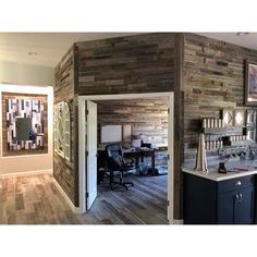 an office with wood paneling on the walls