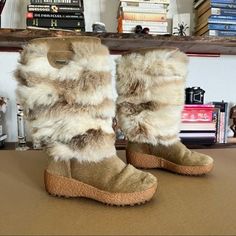 Knock ‘Em Dead Wearing These Fox Trot Fox Fur Boots That Look Fantastic With Skirts, Leggings Or Jeans. Wear Them Aprs-Ski Or On Long Winter Walks To Stay Warm, Dry And Chic. These Soft, Fluffy Boots Feature Durable Cowhide Vamps, Suede Trim And Thick Rubber Soles For Great Traction. They’re Water Repellent And Rated To -25c, With 100% Wool Fleece Lining That Keeps You Cozy. 15” High. Made In Slovakia. Measurements: 2” Heel, 11” Shaft, 14” Circumference Wool Lining Waterproof Size 37 Fox Fur Boots, Kim Tan, Fox Trot, Fluffy Boots, Tan Boots, Winter Walk, Long Winter, Fur Boots, Winter Boots Women