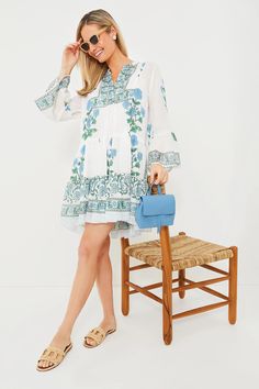 Exclusive White Poppy Flared Sleeve Dress | Juliet Dunn Bohemian Multicolor Dresses For Resort Season, Bohemian Tunic Beach Dress For Resort Season, Bohemian Tunic For Brunch, Bohemian Long Sleeve Dresses For Resort Season, Bohemian Dresses For Resort Season Vacation, Bohemian Vacation Dresses For Resort Season, Bohemian Long Sleeve Dresses For Poolside, Bohemian Dresses For Resort Season Poolside, Bohemian Flowy Dress For Poolside