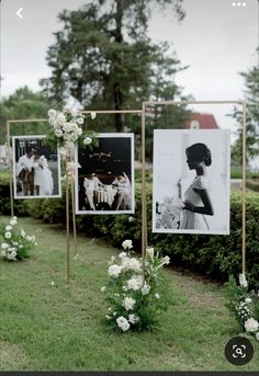 two pictures are hanging on the side of a metal pole with flowers and greenery