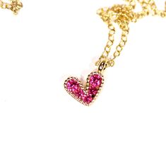 Tiny heart necklace - pink heart necklace - gold heart necklace - love necklace - bff necklace An itty bitty magenta pink heart having happily from a 14k gold vermeil chain at the length of your choice! This tiny, gold plated brass heart holds 5 sparkly crystals. Heart measurement: 8mm Looking for other charm necklaces? https://www.etsy.com/shop/BubuRuby?section_id=12318467 More from Bubu Ruby? https://www.etsy.com/shop/BubuRuby?ref=si_shop ♥ Handmade with love in sunny California ♥ These gems w Pink Heart Beads Necklace For Valentine's Day, Tiny Charm Necklaces For Valentine's Day, Valentine's Day Pink Necklace With Heart Beads, Pink Heart Charm Necklace As Gift, Pink Heart Charm Necklace For Gift, Pink Initial Pendant Necklace As Gift, Pink Double Heart Necklace For Valentine's Day, Pink Initial Pendant Necklace For Gift, Pink Pendant Charm Necklace With Delicate Chain