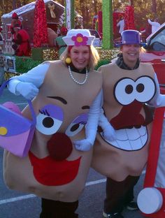 two people in costumes standing next to each other