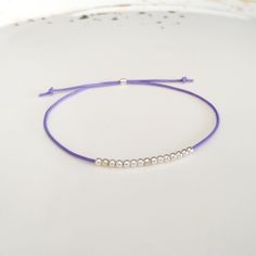 Minimalist, wearable and delicate silver multicolor thread bracelet available in several colors. Length: 20cm adjustable knot. Width: 2mm. Fully adjustable, Handmade in Spain. More colors available in this product => https://www.etsy.com/listing/845364478/tiny-simple-cord-sterling-silver-wish Ideal for a gift and for combinate with other bracelets. All our products are presented in a white organza bag. ♡ Made with love in Valencia ♡ ----------------------------- Discover the NICTE bracelets c Handmade Minimalist Friendship Bracelets, Simple Adjustable Sterling Silver Bracelets, Adjustable Simple Sterling Silver Bracelet, Minimalist Beaded Bracelets With Adjustable Length, Minimalist Friendship Bracelets With Round Beads, Minimalist Resizable Beaded Bracelets, Adjustable Friendship Bracelets With Silver Beads As Gift, Minimalist Adjustable Friendship Bracelets, Minimalist Silver Beaded Bracelets With Adjustable Length