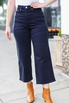 Get ready for fall and stylish layering with these tummy control high-rise wide leg crop jeans. Functional front and back pockets complete these flattering jeans with plenty of stretch. Pair with boots, sandals, heels or flats. Judy Blue Style# 88807 / JB88807 High Rise Zip Fly Control Top 4-Way Stretch Garment Dyed Wide Leg Crop 93% Cotton, 6% Polyester, 1% Spandex True to Judy Blue Sizing Note: the colored Denim from Judy Blue isn't quite as forgiving as the regular denim - if you waver betwee Mid-rise Dark Wash Wide Leg Pants For Fall, Chic Cropped Wide-leg Jeans For Fall, Chic Wide-leg Cropped Jeans For Fall, Chic Fall Cropped Wide-leg Jeans, Chic Non-stretch Dark Wash Cropped Jeans, Chic Denim Blue Wide-leg Cropped Jeans, Chic Wide-leg Cropped Jeans In Denim Blue, Fall Medium Wash Cropped Wide Leg Pants, Chic Cropped Dark Wash Wide Leg Pants