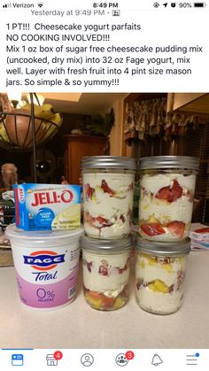 four jars filled with ice cream sitting on top of a counter next to each other