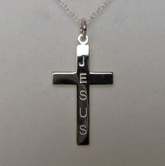 Sterling Silver Jesus Cross Pendant Necklace dimensions of cross: 15mm wide x 28mm material: sterling silver. Sterling Silver Cross Charms With Polished Finish, Personalized Silver Cross Necklace, Nickel-free Sterling Silver Cross Charm, Personalized Silver Crucifix Jewelry, Jesus Cross, Jesus On The Cross, Cross Pendant Necklace, Cross Pendant, Pendant Necklaces