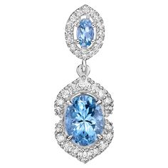 Elevate your look with our stunning Santa Maria aquamarine set, featuring a mesmerizing ice blue hue that radiates elegance. Enhanced with diamonds and crafted in white gold, this pendant offers a timeless allure with a touch of modern refinement. Aquamarine Pendant in 18Karat White Gold with White Diamond. Aquamarine: 1.68 carat, 9X7mm size, oval shape. Aquamarine: 0.21 carat, 5X3mm size, oval shape. White Diamond: 0.07 carat, 2.00mm size, round shape, G color, VS clarity. White Diamond: 0.16 c Luxury Light Blue Brilliant Cut Jewelry, Elegant Light Blue Jewelry With Center Stone, Aquamarine Pendant, Naha, Elevate Your Look, Santa Maria, Blue Hues, Touch Of Modern, Ice Blue