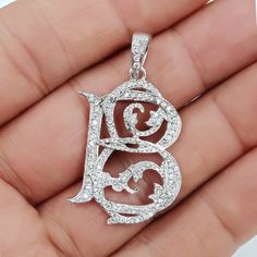 Elegant Monogram Pendant Jewelry, Silver Initial Pendant With Diamond Cut, Luxury Initial Pendant Jewelry With Diamond Accents, Luxury Single Cut Diamond Initial Pendant