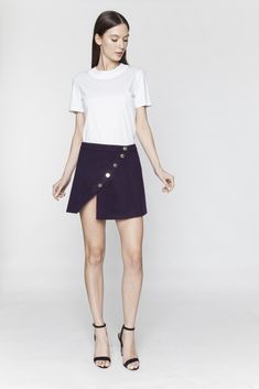 Asymmetrical Snap Skirt - Arianne Elmy Asymmetrical Skirt With Button Closure For Work, Chic Fitted Mini Skirt With Side Buttons, Asymmetrical Skirt With Buttons For Workwear, Workwear Mini Skirt With Side Buttons, Mini Skirt With Side Buttons For Work, Chic Skirt With Gold Buttons For Work, Elegant Asymmetrical Skirt With Button Closure, Elegant Asymmetrical Skirt With Buttons, Chic Fitted Skirt With Side Buttons