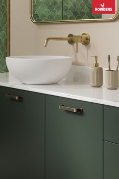 a bathroom sink sitting under a mirror next to a faucet