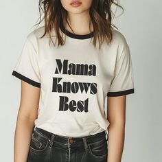 One Tough Mother Funny Graphic Tee Mama Knows Best Funny Mama Tee These custom ringer t-shirts are an all-time classic that offers clean style and a whole lotta attitude in one timeless package. Made with 100% ring-spun cotton, each tee comes with a contrasting 1x1 baby rib binding on the collar and sleeves to give it that classic style. 100% combed, ring-spun cotton Light fabric Classic fit Tear-away label Retro Slogan Tops, Trendy White T-shirt With Lettering, Retro Crew Neck T-shirt With Lettering, Retro Letter Print T-shirt For Spring, Trendy T-shirt With Lettering For Streetwear, White Trendy Tops With Lettering, Trendy White Tops With Lettering, Trendy Streetwear T-shirt With Lettering, Retro Tops With Relaxed Fit For Everyday