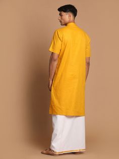 VASTRAMAY Men's Mustard Cotton Kurta And Mundu Set Add a touch of tradition to your wardrobe with this mustard cotton kurta and mundu set from VASTRAMAY. Perfect for special occasions or festive events, this set offers comfort and style. The kurta features a classic design with intricate detailing, while the mundu adds an elegant touch. Made from high-quality cotton, this set is easy to maintain and durable, ensuring long-lasting wear. Features: Mustard cotton kurta with intricate detailing Come Yellow Cotton Silk Kurta With Pallu, Yellow Cotton Silk Kurta For Festivals, Casual Cotton Traditional Wear For Eid, Yellow Straight Kurta Sherwani For Navratri, Festive Mustard Straight Kurta, Casual Yellow Sets For Eid, Mustard Straight Kurta For Diwali, Cotton Kurta In Traditional Fit For Transitional Season, Festive Cotton Kurta With Traditional Fit