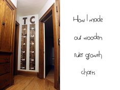 a tall wooden growth chart sitting in the corner of a room