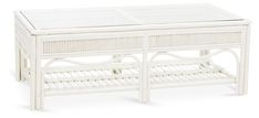 white wicker coffee table with glass top and shelf for storing items or furniture, isolated against a white background