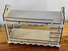 a wooden shelf with two shelves on top of it