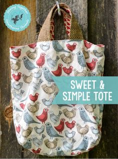 a bag hanging on the side of a wooden fence with words sweet and simple tote