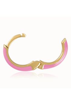 Easy-to-wear hoop earrings will add significant polish to even your most casual ensembles. 1/2" drop; 1/8" width Hinge with snap-post closure Sterling silver with goldtone plate/enamel Imported Pink Enamel Hoop Jewelry, Hoop Huggie Earrings In Enamel, Pink Enamel Hoop Earrings, Trendy Enamel Hoop Jewelry, Nickel Free Enamel Hoop Jewelry, Nickel-free Enamel Hoop Jewelry, Pink Enamel, Huggie Hoop Earrings, Pink Candy