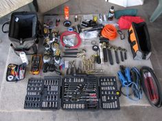 many tools are laid out on the floor